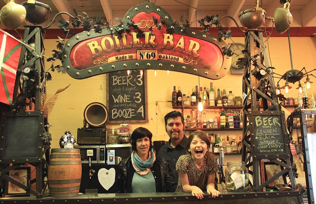 Sarriugarte, Mate, and their daughter Zolie hang in the Empire of Dirt's office-lounge, where the Boiler Bar currently lives. Photo by Jacqui Ipp
