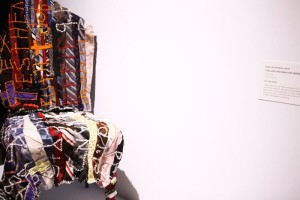 "Chair with embroidery and applique". Pieced by Rosie Lee Tompkins.