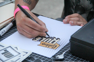 Marcos LaFarga draws a picture.