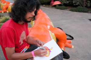 Alex Sodari drawing a scene from Fairyland.