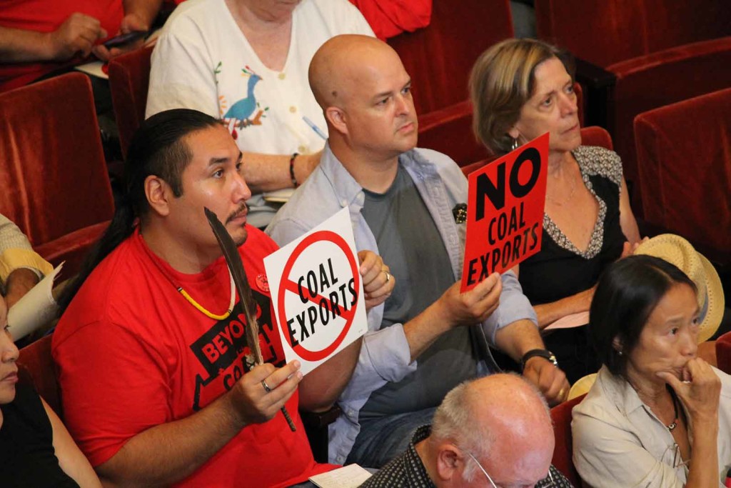 Opposers protest the export of coal at the public hearing at Oakland City Hall on September 21. Photo by Lucas Waldron.