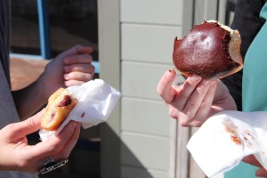 Enjoying a bite from Doughnut Dolly's.