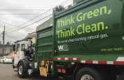 A Waste Management collection truck during a daily pickup in Oakland, CA