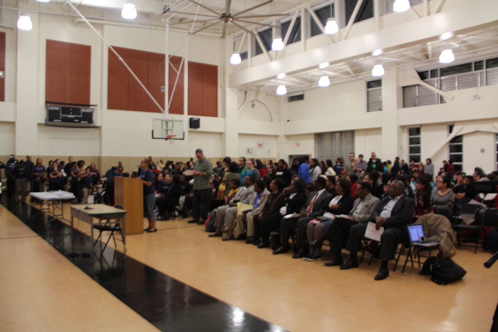 Supporters of KIPP Bridge Charter School speak to the OUSD school board at Wednesday night's meeting.