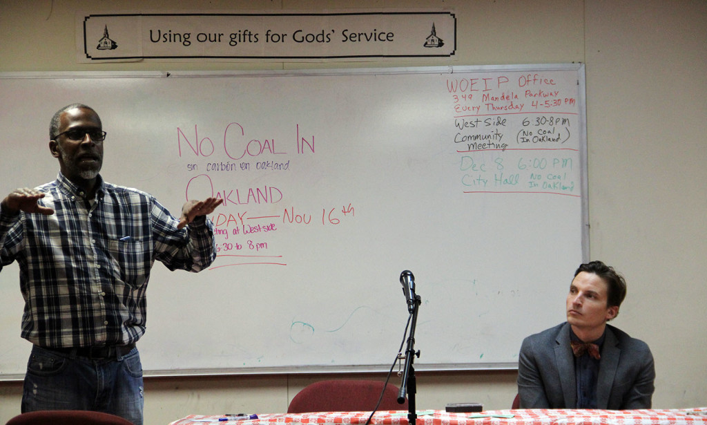 Pastor Ken Chambers from West Side Missionary Baptist Church, and Reverend Will Scott, program director of California Interfaith Power and Light, discuss with other religious leaders and parishioners the next steps to take to stop coal from exporting from the Oakland Bulk and Oversize Terminal.