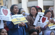 Fast food workers, union representatives and their allies converged on Frank Ogawa Plaza yesterday afternoon to call for a rise in the minimum wage to $15 an hour. Photo by Teresa Cotsirilos.