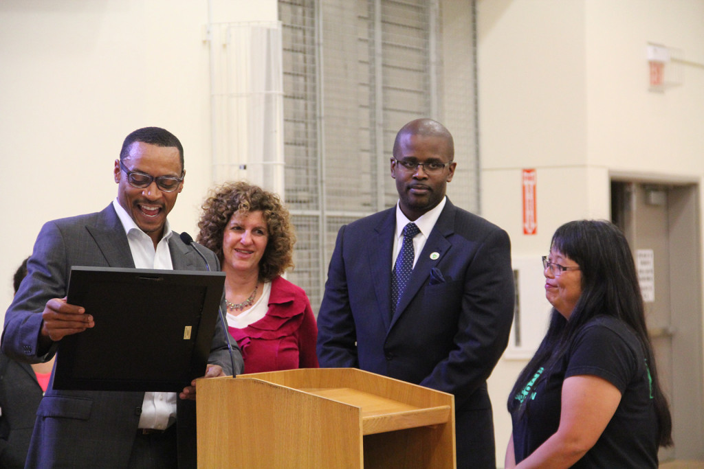School board president James Harris (District 7) honors Greenleaf Elementary teacher Ann Park, who was one of five California Teachers of the Year for 2016. Photo by Katherine Rose.