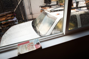 A copy of the One Year Bible is stacked against a window at Teen Challenge.