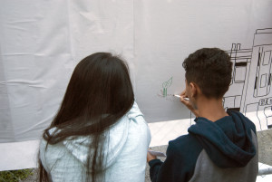Members from AYPAL wrote on a poster their ideas for the vacant lot on 11th St. and Franklin Street.