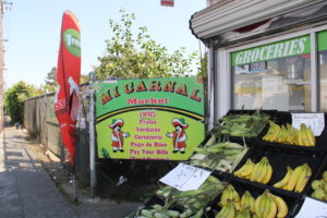 Outside of Abdul Talev's grocery store, Mi Carnal Market.