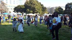 Attendees of the Black-Eyed Pea festival dance and celebrate.