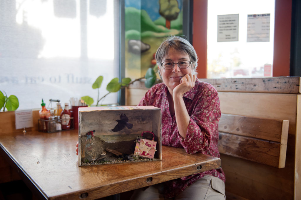 Claire Wings with her diorama of 'Tale for the Time Being' by Ruth Ozeki. Photo by Rosa Furneaux