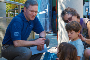 Stephen Frick, former NASA astronaut and Lockheed Martin Center spokesperson for the day, talks to Lucio Amaral, 5 and his grandmother, Leslie Quintero, 69, approach Frick to ask him questions about space and if it was feasible dream to become an astronaut at the Chabot Space and Science Center on Friday, September 9, 2016.
