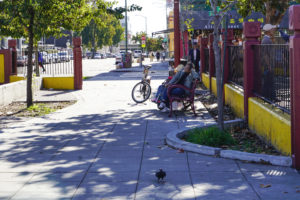 A man sits on a bench after a game of bingo at the Lincoln Square Recreation center at Lincoln Square Park on Thursday October 13, 2016. (Yesica Prado/Oakland North)