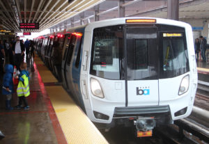 New BART cars were unveiled Sunday at MacArthur Station during an open house event. The cars come equipped with electronic maps and brightly colored seating, among other features.
