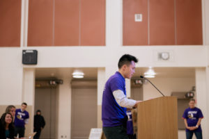 Sixth grade math teacher Paul Yen speaks to the board about his experience as an educator at Lionel Wilson College Preparatory, during the school's charter renewal. Photo by Rosa Furneaux.