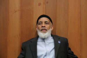 Oakland High School Principal, Matin Abdel-qawi, listens to the State of the Schools speech Tuesday night after delivering the opening remarks.