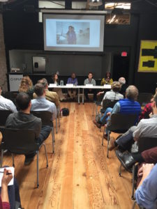 Jahi shares a photo of Trayvon Martin during her speech at the Equity in Tech panel discussion.