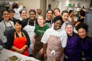 All 12 top chefs take a photo together in the kitchen at Taste, an annual culinary event to fundraise money for Girls Inc. programs on October 15, 2016. Photo courtesy by Girls Inc. of Alameda County.