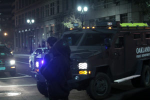 Oakland police deploy a BearCat armored vehicle during the protest. Photo by Andrew Beale.
