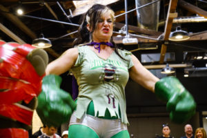 "Sarah Smash" gets ready for her next match at the Lady wrestling matches as part of a fundraiser to raise money for Haitian women and children on Sunday, November 13, 2016. (Yesica Prado/Oakland North)