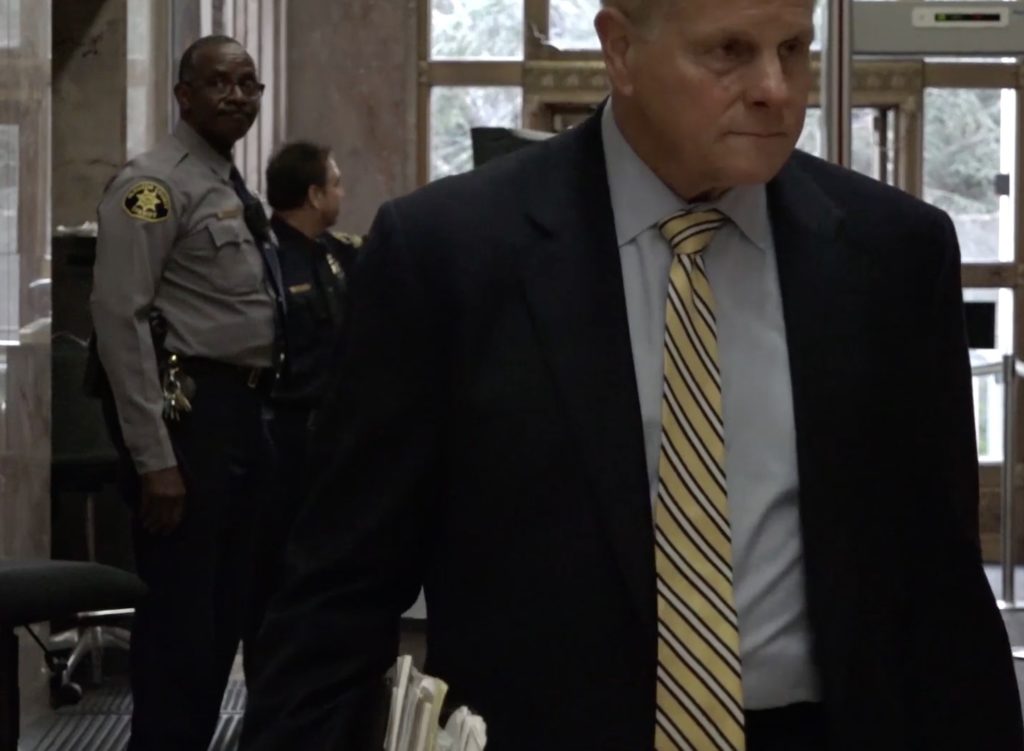 Attorney Michael Rains enters Alameda County Courthouse. Photo by Rachel Loyd.