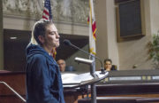 "In order to keep my kids in school, I need a house,” said Micah Allison, who co-founded the Ghost Ship art collective with her husband Derick Ion Almena, before the Oakland City Council at a special meeting Monday night on tenants’ issues. Photo by Abner Hauge