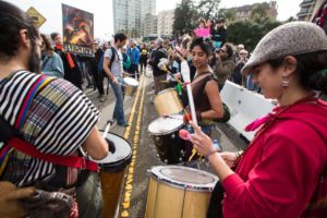 A group plays the drums along the march route. Photo by Khaled Sayed.