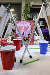 Tables set up close together to encourage interaction between guests. (Photo Jeff Weisinger)