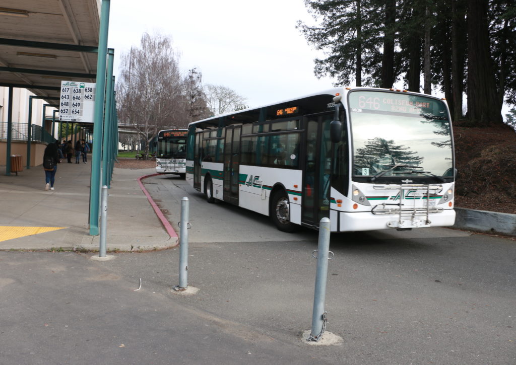 AC Transit buses leave Skyline High School filled with students. (Photo: Jeff Weisinger)
