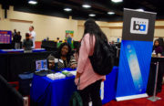 A BART representative talks about the opportunities and careers available at the company during the Oakland Youth Careers Expo on April 13. Photo by Marian Davidson.