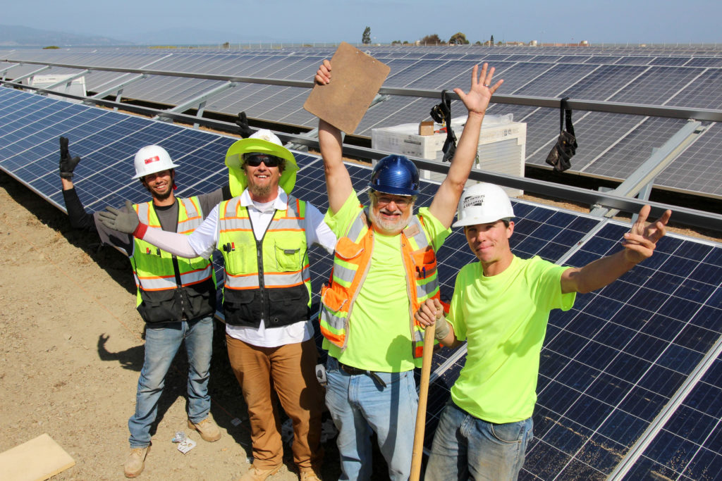 RichmondBUILD workers installing solar panels at Freethy Industrial Park. (Photo courtesy MCE)
