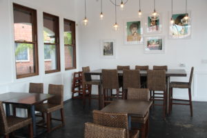 A view of Curry Up Now's dining room, reminiscent of old Calcutta office buildings and apartments, with a modern flair. (Ryan Lindsay/Oakland North)