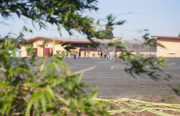 Students at Brookfield Elementary School in East Oakland play on the school's blacktop after school. A vegetation barrier was installed at the school by the U.S. Environmental Protection Agency in an attempt to reduce air pollution at the school, which is situated by one of the busiest freeways in the Bay Area.