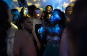 Teens at Kaiser Permanente Pediatric Prom sing along on the dance floor.