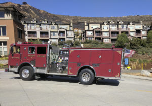 A fire truck drives up the hills of the Monte Villas development in the Oakland hills. Photo by Drew Costley.
