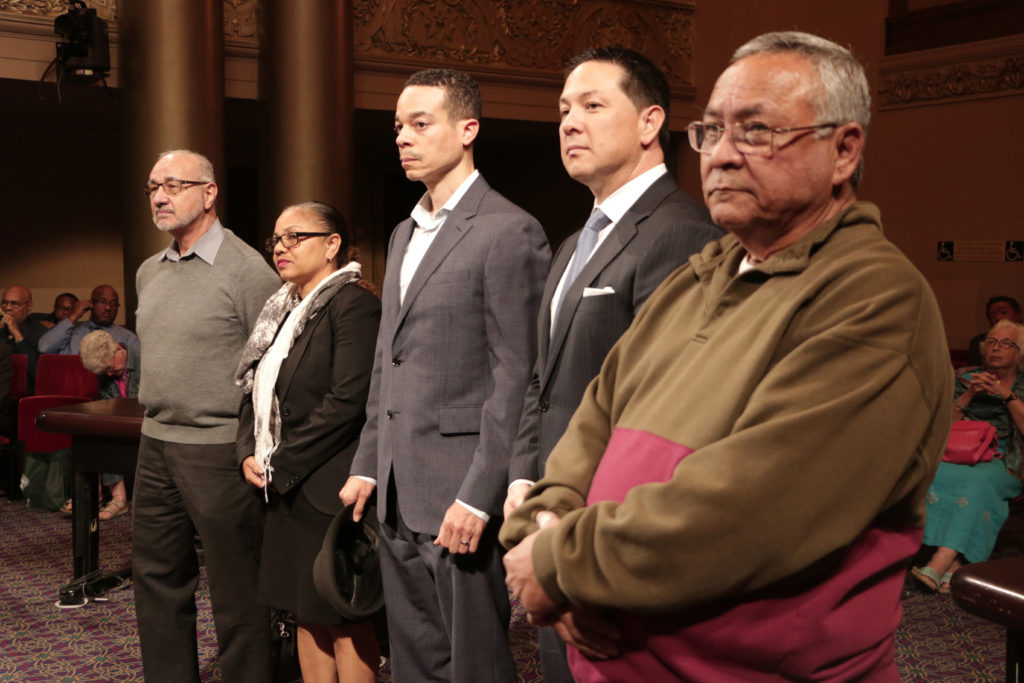 Oakland's new police commission. Bookkeeper and community activist Jose Dorado, deputy court clerk Ginale Harris, attorney Thomas Smith, attorney Edwin Prather, and attorney Mike Nisperos. (Photo by Alondra De La Cruz).