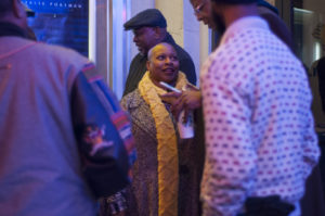 Cynthia Prince, 58, stands in line with her friends waiting to go into the event. Prince is a board member of Lincoln, a local nonprofit that sponsored the event.