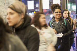 Event attendees file into Grand Lake Theater.