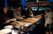 The Refugee Women's Empowerment Catering Group provided traditional Afghan food during the Levi Strauss & Co. holiday party in 2017. Photo by Rafiullah Amini.