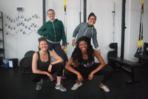 Gym members Ally Noyes (upper left), Ivón Hernandez (upper right), Emma Craig (lower left), and Gabrielle Hooks (lower right) gather after completing Page's Power Circuit class on Sept. 7.