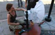 Sudo Mesh co-creator Jenny Ryan makes a few tweaks to the ad-hoc AirFiber test setup.