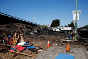 Remnants of The Village fire, which tore through the homeless encampment early Tuesday morning. Photo by Jessica Alvarenga.