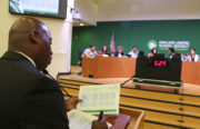 OUSD Chief Business Officer Marcus Battle updates the Board on the district's finances. (Photo by Mickey Capper)