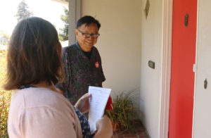 Gary Yee knocking on doors with supporter Lacy Asbill in the Lincoln Highlands.