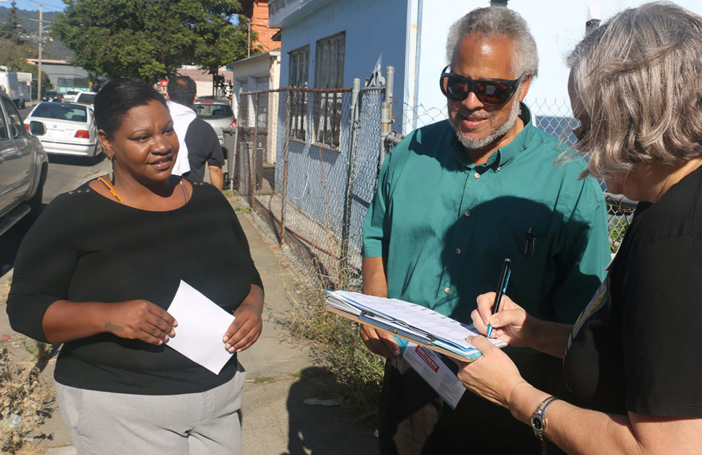Clarissa Doutherd out talking with residents in the Allendale neighborhood about her campaign.