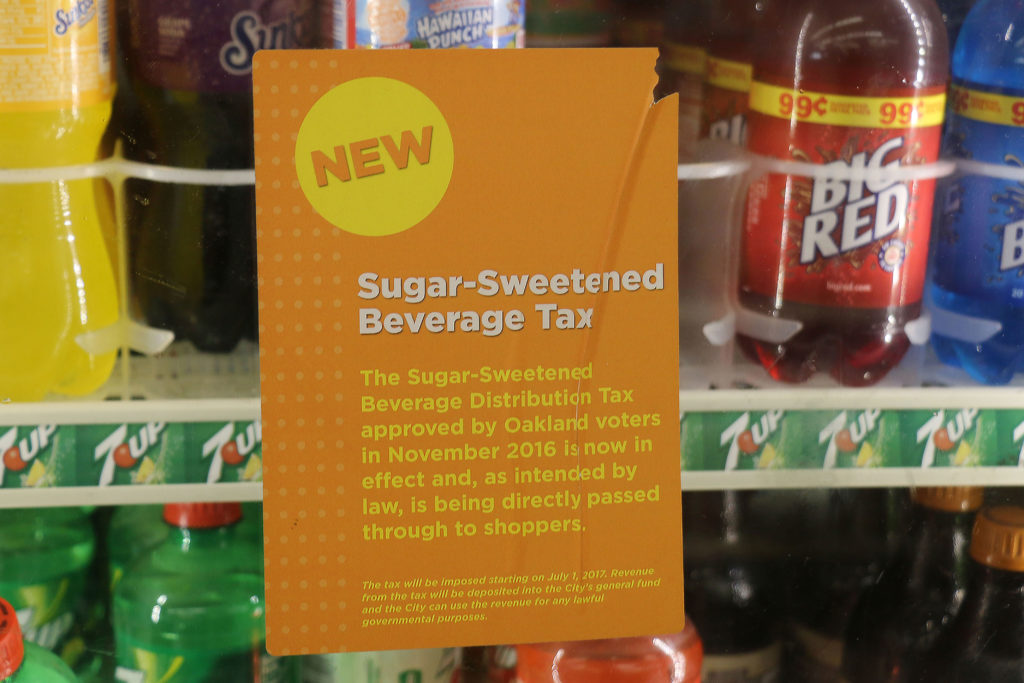 The mysterious sign appearing in Oakland convenience stores.