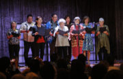Church members perform a hymn in honor of the congregation's past