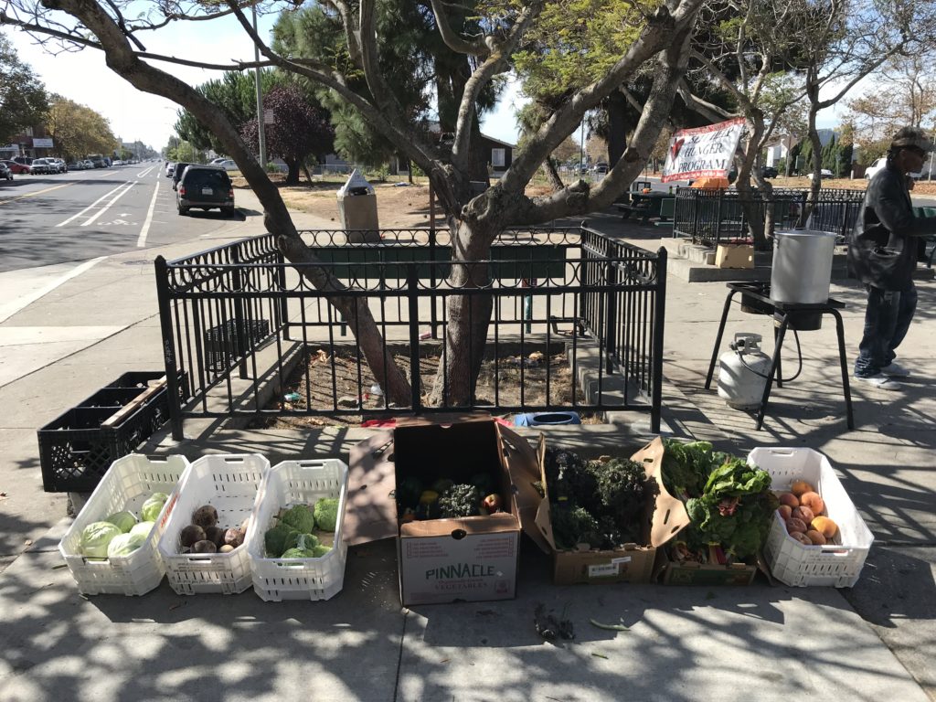 Every week, boxes of fresh produce are dropped off at Jasper P. Driver Plaza.