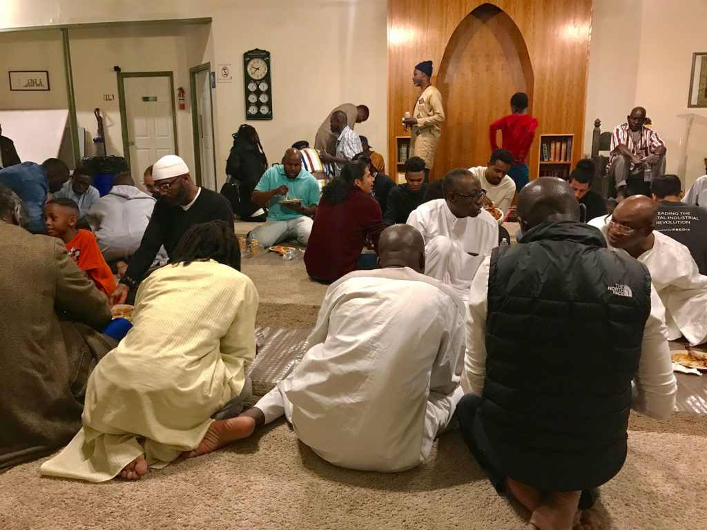 Lighthouse members join together for a meal in observance of Iftar.